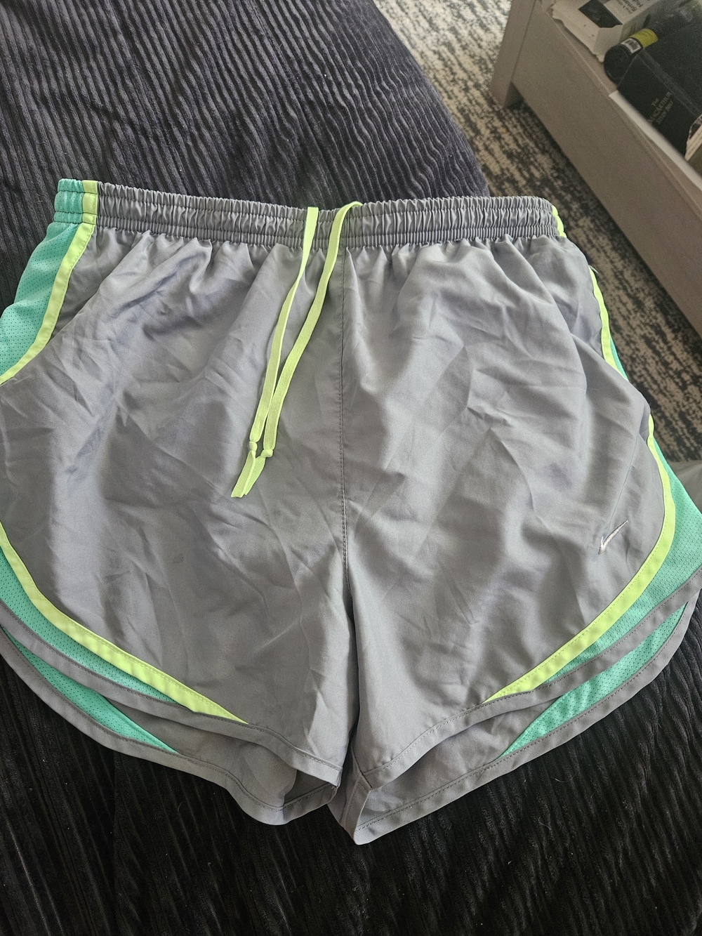 Nike Women's Gray Athletic Shorts with Neon Green and Teal Accents